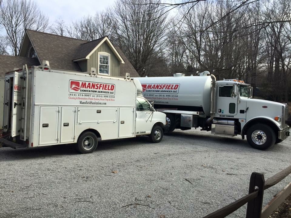 Mansfield Sanitatin trucks on the job. Give Mansfield Sanitation a call today for quality service at an affordable price.