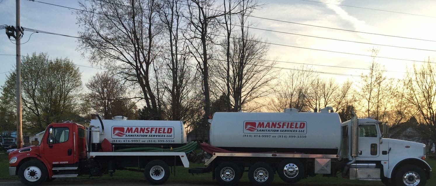 Mansfield Sanitation trucks at sunrise. The best in the field. You can rely on our reputation & experience. Call us today!